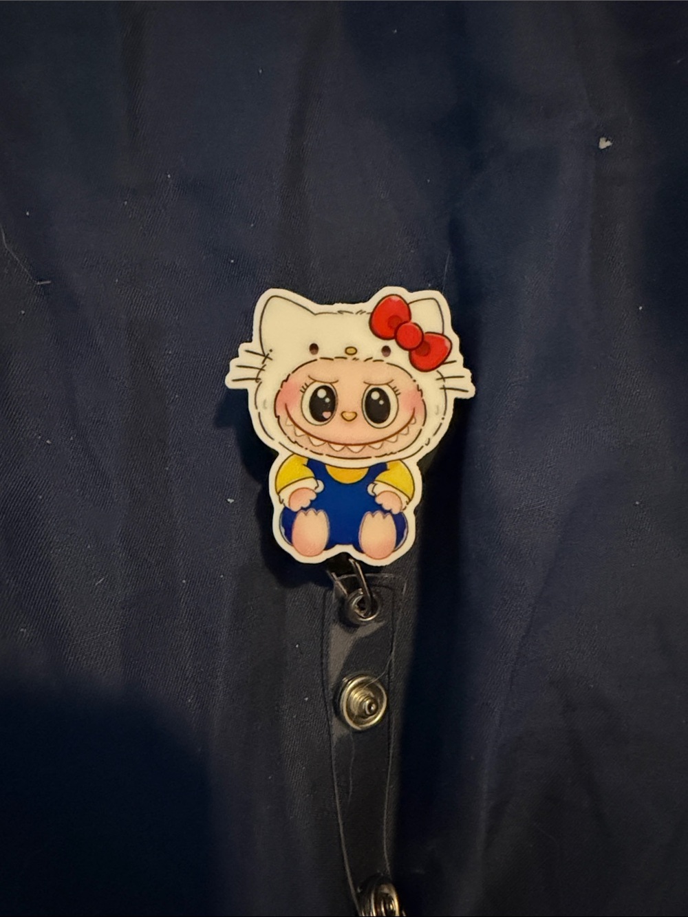 Cute White Character Badge Reel with Blue Outfit